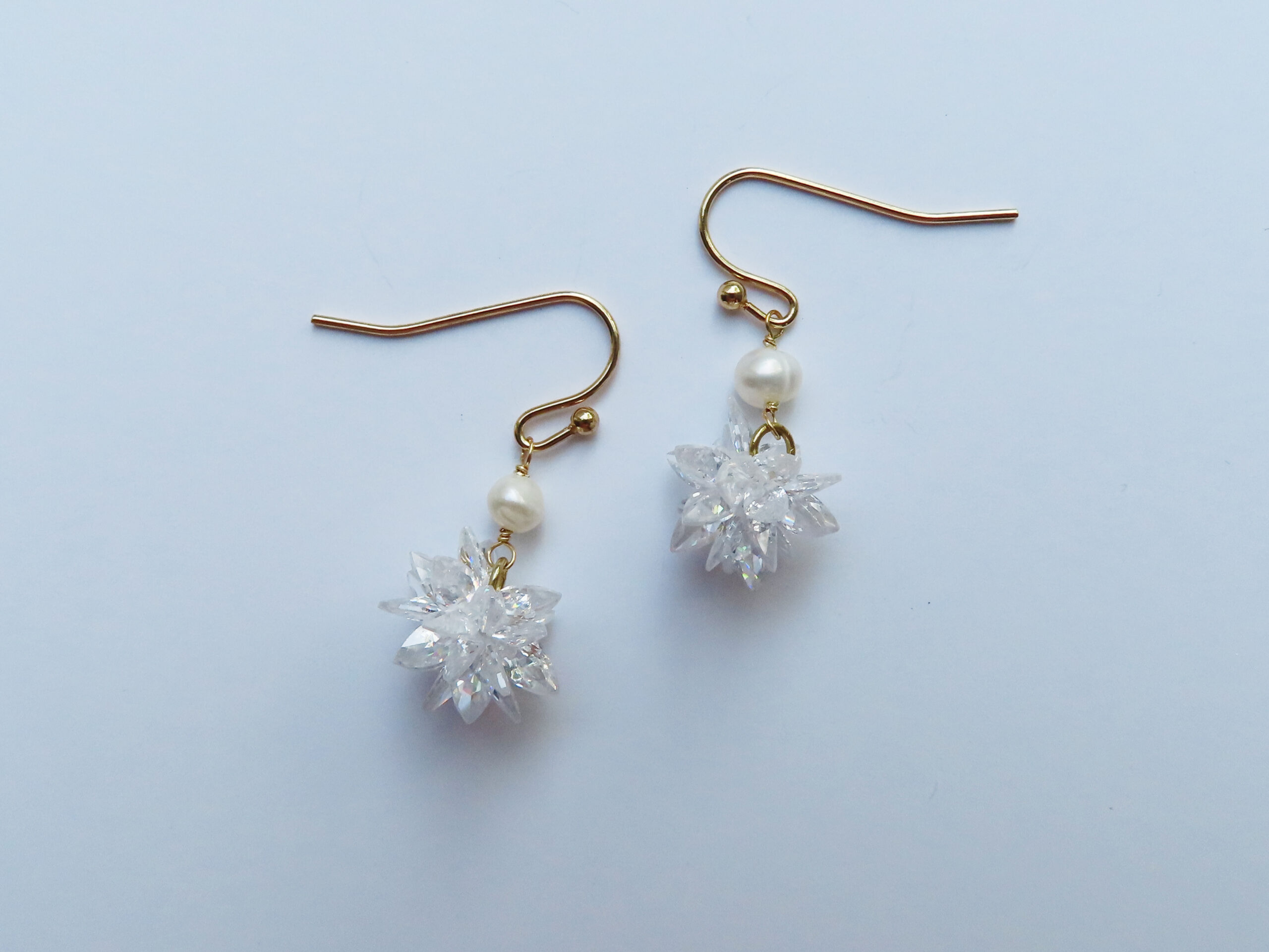 Snowflake and freshwater pearl earrings